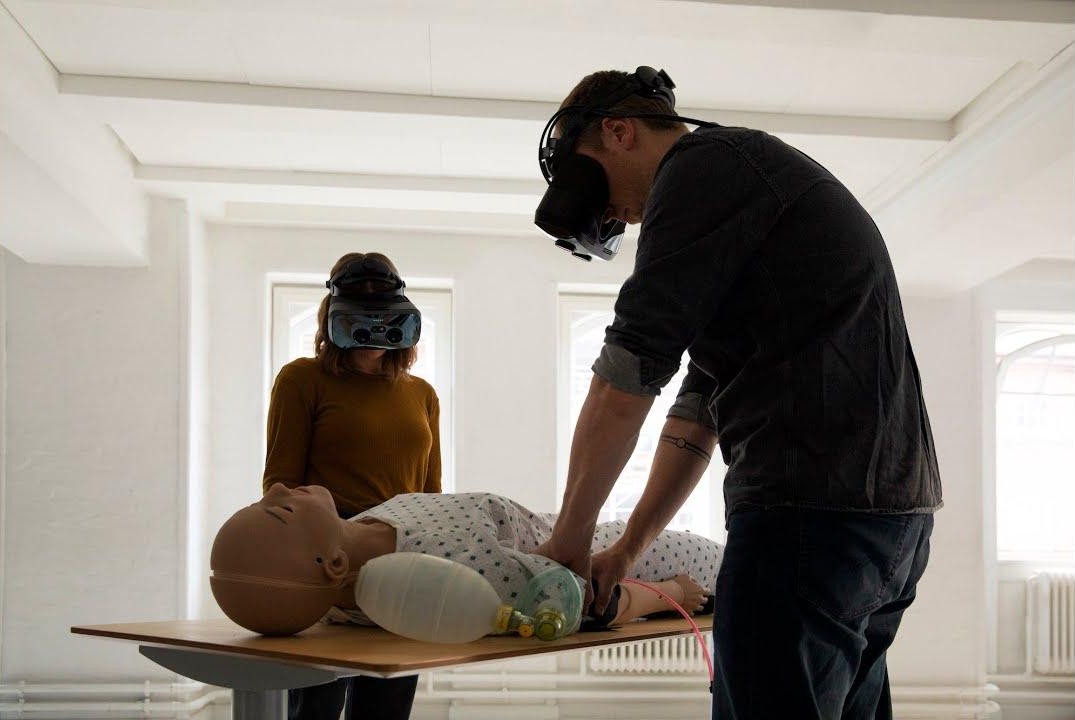 XR prototyping session with VR headsets and patient simulation mannequin